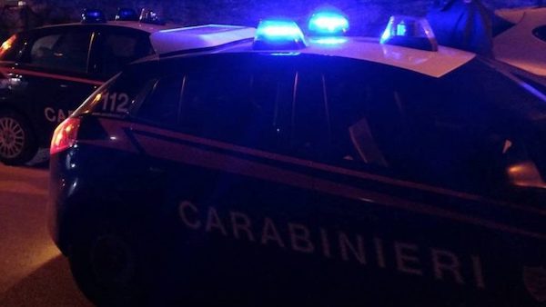 Rissa in famiglia dopo la Comunione della bambina